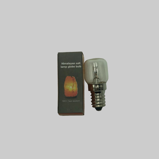 Himalayan salt lamp bulb with packaging on a light gray background